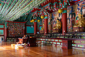 Fototapeta premium Korean traditional temple with Buddhist wooden buildings, traditional patterns of dancheong and roof tiles