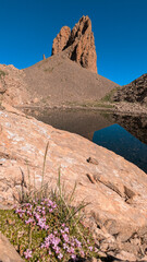 The Ibón de Lavasar, surrounded by the Agujas de Lavasar, shows the pristine landscape of the Chistau Valley, a destination of tranquility in the Aragon Pyrenees.
