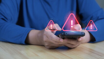 A person is using a smartphone with virtual error 404 alerts on the screen, representing cyber attacks, security warnings, and the dangers of network failures and spam in digital technology.