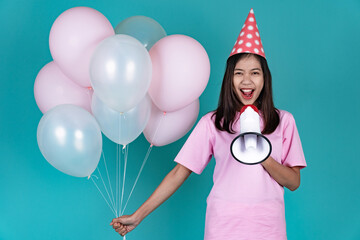 Portrait of Happy Young Asian Woman Celebrating Birthday With Megaphone