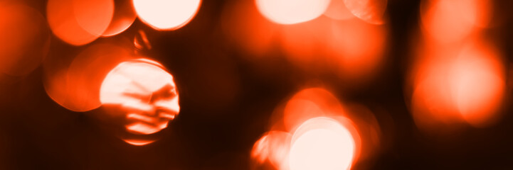 Blurred lights, dark orange abstract background banner