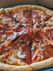 Pepperoni pizza slices arranged in circular pattern, cheese melting, crust visible