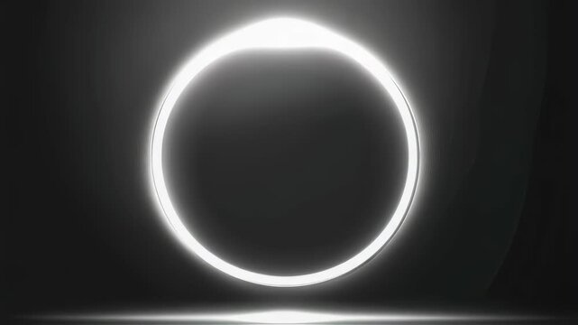 Glowing circle transitions from red to white in darkroom animation