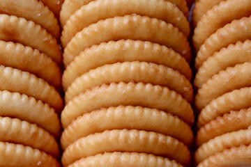 Stacked crackers. Close-up, zoomed-in cut.