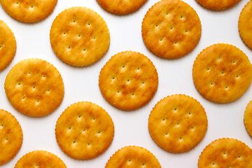 Crackers lined up in a row. Close-up cut.