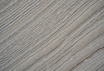 Close-up of natural wooden texture with visible grain, perfect for backgrounds or design elements.