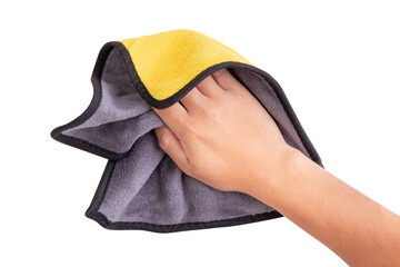 Hand holding a yellow and gray microfiber cloth for cleaning, isolated on white background.  designed for dusting