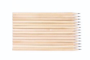 Many graphite pencils on white background, flat lay