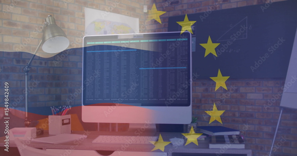 Poster showing computer monitor displaying code on desk with brick wall, map poster, charts, star overlay
