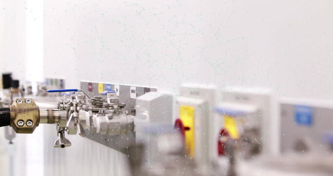 Displaying stainless valve assembly on lab bench with hose coupling, lever valve, colored housings