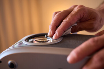 It is important to clean a projector lens carefully using a microfiber cloth for best results