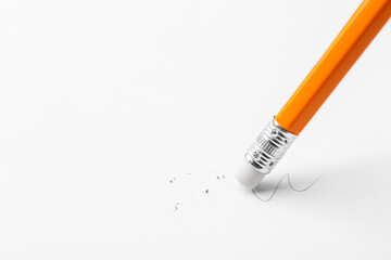 Using pencil with eraser on white background, closeup. Space for text