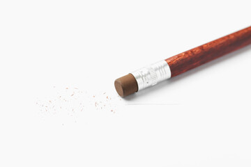 Pencil with eraser and scraps on white background, closeup