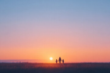Fototapeta premium family of four silhouetted against serene sunset holding hands in harmony