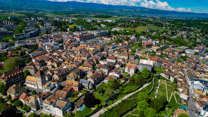 Panoramic aerial of the old town of the city Nyon in Switzerland on a sunny noon in summer