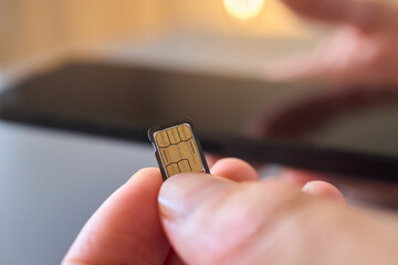 Detailed Process of Installing a SIM Card Utilizing Various Smartphone Components and Accessories