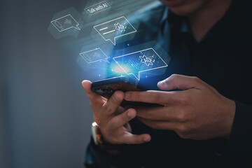Digital AI chatbot, Happy man using mobile smartphone with AI chatbot for online information at home, conversation assistant. Chatbot Ai Artificial Intelligence technology concept.