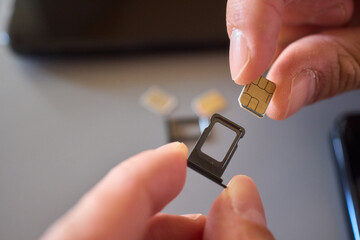 Detailed Process of Installing a SIM Card Utilizing Various Smartphone Components and Accessories