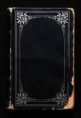 old black book cover with silver floral ornament