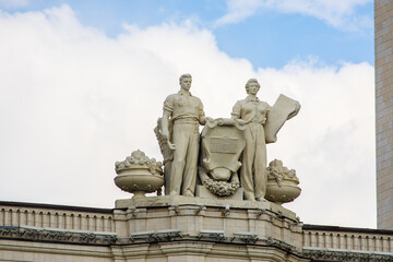 Statue on the roof of a Soviet building in Moscow