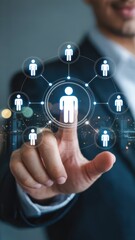 Businessman touching digital network of people icons with connection nodes. Human resource management, digital networking, and professional recruitment.