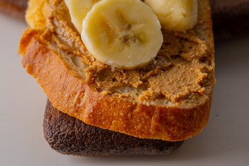 Toast with peanut paste and banana slices