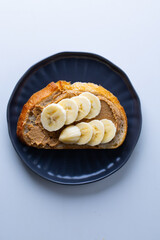 Toast with peanut paste and banana slices