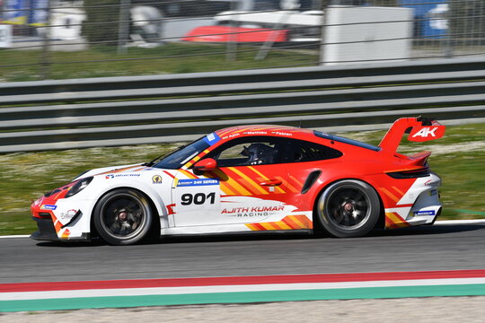 Scarperia, Italy - March 20th 2025: Porsche 911 GT3 Cup (992) of Team Ajith Kumar Racing by BKR drive by Kumar-Duffieux-Detry in action during 12h Michelin at Mugello Circuit.