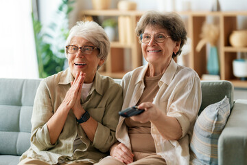 Senior women watching TV