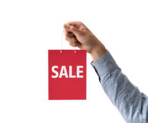 A hand displaying a red sale tag, perfect for promoting discounts and deals.