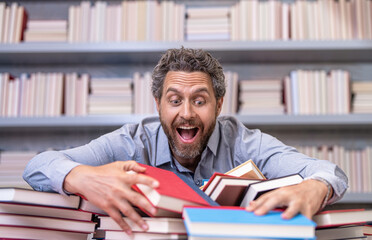 school classroom full of books. school education for teacher or student. school professor reading...