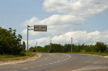 A road with trees and power lines