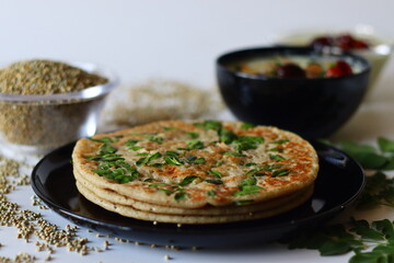 Bajra dosa, also known as millet pancake, made with nutritious muringa or drumstick leaves