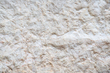 Close-Up of Natural Stone Texture with Soft Beige and White Tones
