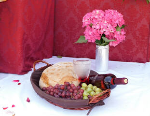 offerings of bread and wine to the saint