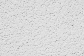 Textura de una pared con gotelé pintada de blanco