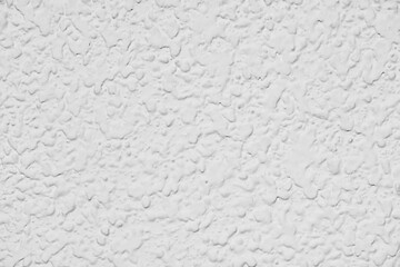 Textura de una pared con gotelé pintada de blanco