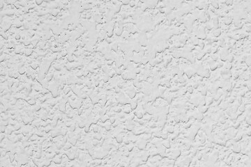 Textura de una pared con gotelé pintada de blanco