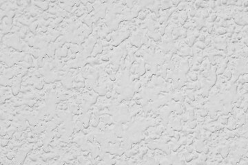 Textura de una pared con gotelé pintada de blanco