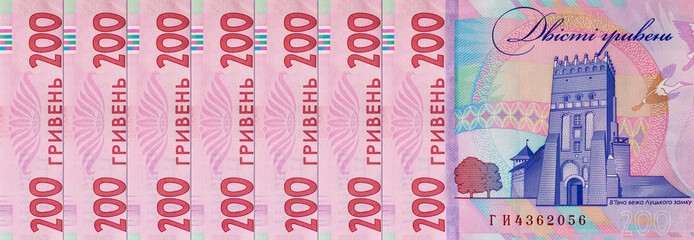 Ukrainian banknote 200 hryvnia with the image of Lutsk Castle. Paper money of Ukraine.