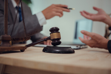 Businessmen consult with lawyers, submit additional documents, and pay for lawyers' services. After reaching an agreement and signing the contract, the two shake hands. Concept, Justice, and Lawyers