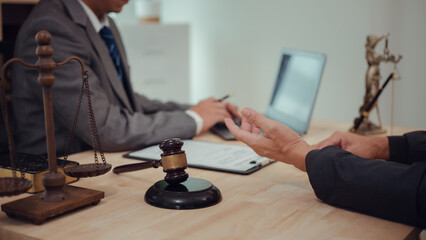 Businessmen consult with lawyers, submit additional documents, and pay for lawyers' services. After...