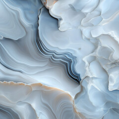 Smooth blue agate stone with flowing patterns and textures