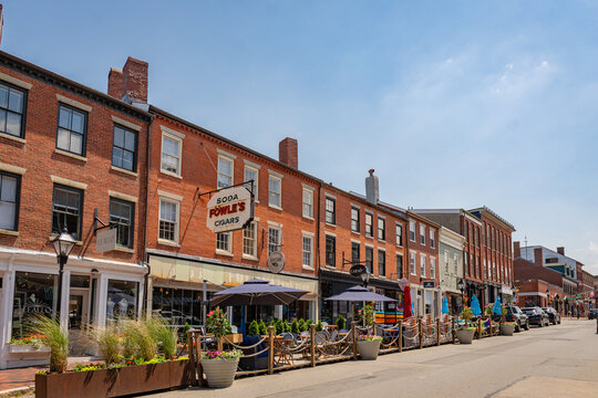 Newburyport, MA, US-June 23, 2025: Street scene in historic downtown of this small town with its quaint streets with 19th century brick buildings and trendy shops and restaurants.