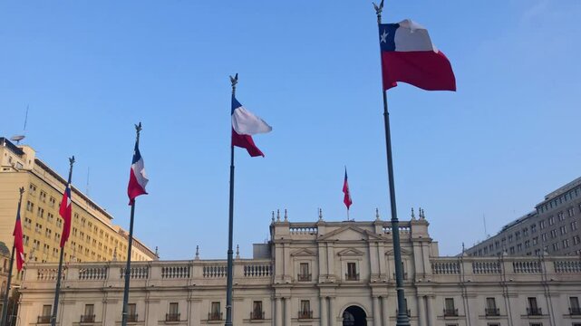 Palacio de la moneda with chilean flags. Palace of Moneda. Santiago chile square.