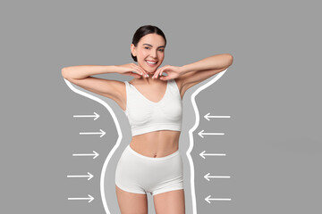Beautiful woman showing her slim body as result of healthy lifestyle on grey background. Outline of...