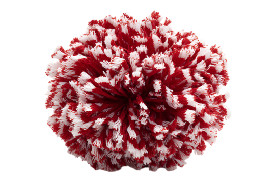 Close up of a fluffy red and white pom pom.