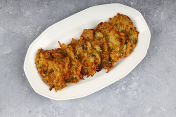 Mucver, Turkish traditional food. (Turkish cuisine) Homemade Food with Zucchini.