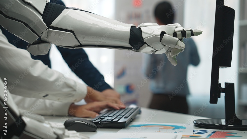 Poster a robotic arm engages with a computer in a modern office, highlighting the blend of human ingenuity 