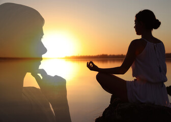 Woman meditating near river at sunrise, double exposure with silhouette of pensive girl. Changes in...